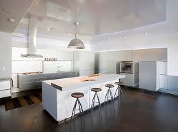 The dark, moody tile walls, sleek backsplash, and stainless steel appliances assert an undeniably and it's even fresher when you paint your bar stools a buoyant shade of mint green hue and hang a copper pendant light overhead. 12 Unforgettable Kitchen Bar Designs