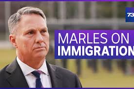 Justine Lloyd packing moving boxes