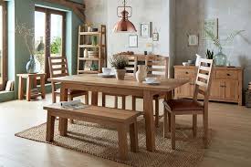 An extendable dining table and chairs is the perfect option if you have limited space in your dining room, but occasionally need additional seats around your dining table for special occasions. Bourg Oak Extending Dining Table With 4 Ladder Back Chairs And Bench Cfs Furniture Uk