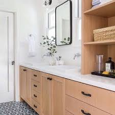 cabinet between bathroom sinks design ideas