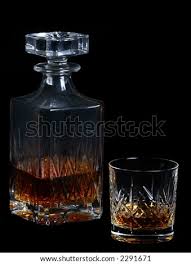 5 out of 5 stars. Whiskey Bottle And Whiskey Tumbler Glass On A Black Background Stock Images Page Everypixel