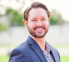 About Dr. Travis Whitney