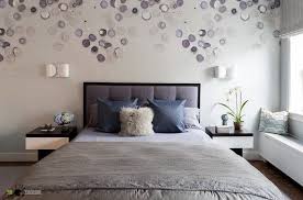 Many Round Off White And Purple Decorations On A Wall Behind A Double Bed Bedroom Decorating Ideas Wall Decor Bedroom Master Bedroom Wall Decor Bedroom Wall