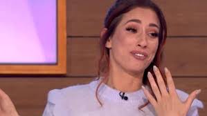 The loose women star shared a photo of herself with her family and fiancé joe swash holding up a picture of their baby scan as they stood outside their newly renovated children's playhouse in their garden in essex. Stacey Solomon Says None Of Her Teeth Are Real As Pregnancy Left Her With Black Gnashers Daily Mail Online