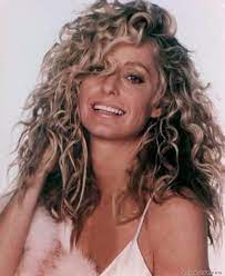 Her shoulder length hair was heavily textured and layered to create lots of body, attitude and movement. Dazzling Divas Farrah Fawcett Beauty Farrah Fawcett Hairstyle