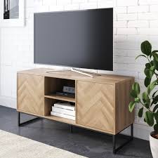 Sleek monetizes on the ever dreaded waiting in lines, while providing convenience to all. Nathan James Dylan Media Console Cabinet Tv Stand With Hidden Storage Herringbone Pattern Wood Metal Oak Black Nathan James
