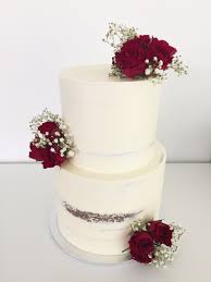 2 Tier Wedding Cake With Red Roses Baby S Breath Top Tier Chocolate Mud Cake With Oreo Buttercream Bottom Tiered Wedding Cake Chocolate Mud Cake Mud Cake