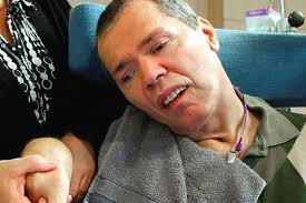 Locked in a coma, I could hear people talking around me'