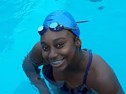 FFSC's De-Nicha Lewis, recently brought home the gold at the National  Secondary Schools Swim Meet where she placed first in the girls 50m  butterfly, freestyle and backstroke, coming second in the 50m