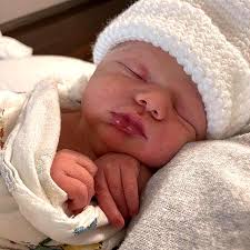 Bachelor's Lauren Bushnell, Chris Lane's Son Dutton's Photos