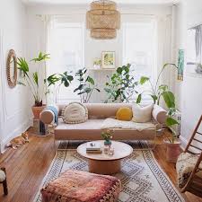 It's even better if the sofa has a jewel tone fabric like the matte emerald green sofa in the amsterdam home. 19 Boho Living Room Ideas Hunker