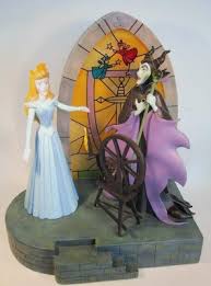 The good fairy, realizing that the princess would be frightened if alone when she awakens, uses her wand to put every living person and a. Sleeping Beauty At The Spindle And Maleficent Figure From Our Other Collection Disney Collectibles And Memorabilia Fantasies Come True