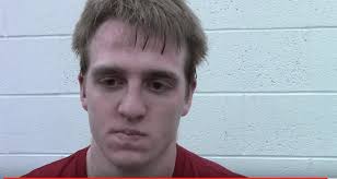 Connor Shaw after late takedown to advance