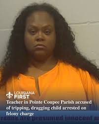 A former "Teacher of the Year," Sade Delesia Nacheyle Nelson, has been  suspended from her job after allegedly trying to mow down her baby's daddy  with her car in a Walmart parking