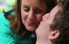 Nurse and paralyzed man bond in friendship and laughter