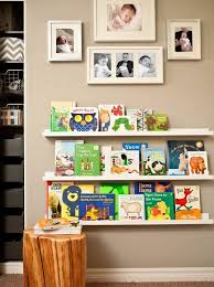 You Can Achieve The Same Look By Using Ikea S Mosslanda Picture Ledge Boy Room Wall Bookshelves Baby Boy Nurseries
