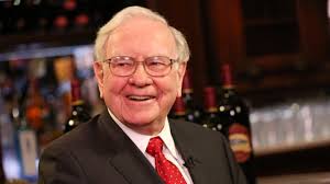 Warren Buffett examining stock options