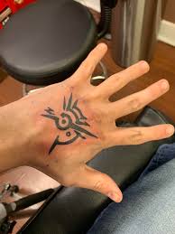 Boondock saints cross tattoo