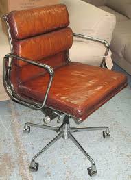 The hallmark of a good design is that it does its function so well that it doesn't need to change. Sold Price Revolving Desk Chair Charles Eames Style Tan Brown Leather Upholstered R Invalid Date Bst