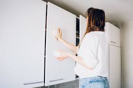 A lot of kitchen cabinet stains are caused by grease splatters from cooking food. How To Deep Clean Kitchen Cabinets