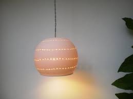 Small Porcelain Ball With Spiral Holes Etsy Ball Lights Ceramic Light Ball