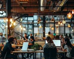 Imagen de modern coworking space bustling with people using laptops