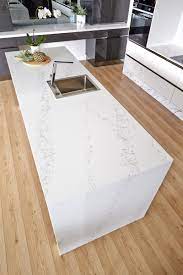 The desired look is earthy chic, and this particular product will bring that to life for you! Statuario Quartz Quantum Quartz Quantum Quartz Natural Stone Australia Kitchen Benchtops Quartz Surfaces Tiles Granite Marble Bathroom Design Renovation Ideas Wk Management Services P L Australia