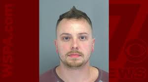 Man charged after 2 kids had bruises