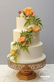 Elegant Smooth Buttercream Wedding Cake With Fresh Flowers Peach Flowers Cascading Flowers Cascading Flower Cakes Fresh Flower Cake Wedding Cake Fresh Flowers