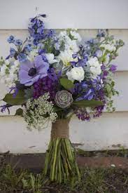 Bring some bright and colorful cheer into someone's life by ordering a purple flower bouquet right to their front doorstep. Pin By Bella Villeda On Purple Wedding Flower Ideas Purple Wedding Bouquets Blue Wedding Bouquet Ranunculus Wedding Bouquet