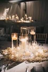 Pin By Soon To Be Mrs Kimberly Gardn On Centerpieces Candle Wedding Centerpieces Wedding Candles Diy Sweetheart Table Wedding
