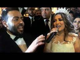 كشف المطرب المصري تامر عاشور، عن استقباله مولودته الأولى، من زوجته سمر أبو شقة، واختار اسمًا غير متداول في مصر ولكنه أثار إعجاب جميع متابعيه، حيث أطلق على مولودته أيام، وطلب من محبيه أن يشاركوه الفرحة، وتمني لهم. Ø²ÙˆØ¬Ø© ØªØ§Ù…Ø± Ø¹Ø§Ø´ÙˆØ± ØªØºÙ†Ù‰ ÙˆØ´Ø§Ù‡Ø¯ ÙƒÙŠÙ Ø¯Ø§Ø¹Ø¨Ù‡Ø§ Ø²ÙˆØ¬Ù‡Ø§ ÙÙ‰ Ø­ÙÙ„ Ø²ÙØ§ÙÙ‡Ù… Youtube