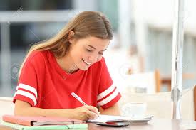 Happy Student Girl Studying Taking Notes Sitting In A Coffee.. Stock Photo, Picture And Royalty Free Image. Image 85272189.
