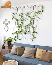 Create An Indoor Trellis By Training Your Pothos Plant To Climb Up A Sculptural Metal Frame Plus It Doubles As Wa Plant Decor Indoor Indoor Vines Home Decor