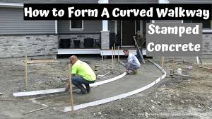 Basically, this is a concrete board placed as the lowest slat of the fence, since a wood board placed close to the ground will quickly r. How To Form A Curved Concrete Sidewalk Stamped Concrete Walkway Part 1 Youtube