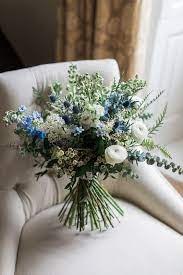 Maybe you would like to learn more about one of these? Bridal Bouquet White Shades Of Blue Rannunculus Thistle Euco Roses Natural Style Flower Bouquet Wedding Blue Wedding Bouquet Bridal Bouquet Blue
