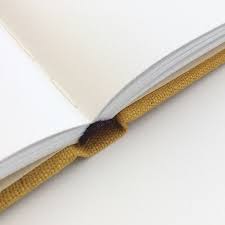 Make sure the plastic is properly in place and drop the page back onto it. 7 Tips For More Professional Looking Handmade Books Paperiaarre