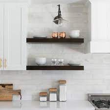 Amazing gallery of interior design and decorating ideas of carrera marble shelves in living rooms, dining rooms, bathrooms, laundry/mudrooms, kitchens by elite interior designers. Carrera Marble Shelves Design Ideas