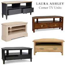 Corner cabinets can solve that problem too. Light Oak Angled Television Stand Corner Cabinet With Drawers
