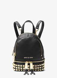 Related:michael kors backpack black leather michael kors backpack medium black michael michael kors rhea backpack medium pebbled leather black gold studded zip pocketstop michael kors abbey medium studded backpack leather blacktop rated seller. Michael Kors Rhea Mini Studded Leather Backpack In Black Lyst