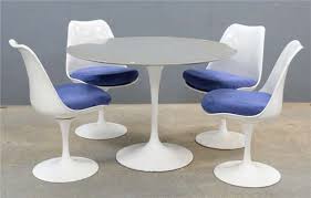 Discover unending possibilities with favorable saarinen tulip table at alibaba.com. Saarinen Eero Tulip Dining Table With Four Accompanying Chairs Mutualart