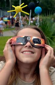 Crowds lament as clouds shroud eclipse in Savannah skies