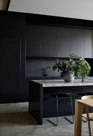 Stylish Modern House With Pool In Suburbs Of Melbourne Photos Ideas Design Modern Black Kitchen Modern Kitchen Design Kitchen Interior
