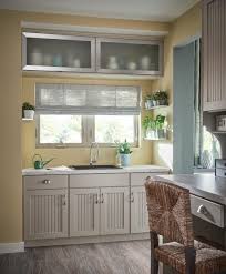 Selecting a gorgeous cabinet insert can transform your space and add a decorative and personal style to your kitchen. Bellagio Brushed Stainless Steel With Frosted Decorative Glass Inserts Schuler Cabinetry At Lowes