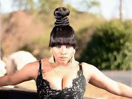 Super easy super fast super trendy up do #bunhairstyles. Coiled Bun Updo Hairstyle With A Chinese Bang From Tish Summers