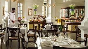 The classic singapore sling was concocted way back in the early 1900s, and credit goes to raffles hotel's long bar bartender, ngiam tong boon. Raffles Hotel Singapore Halal Holidays