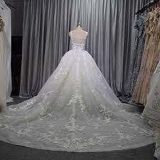 Many people spend a lot of money on their wedding. 2019 New Design Bridal Gown Guangzhou Factory Wedding Dress Elegant Champagne Color Gown