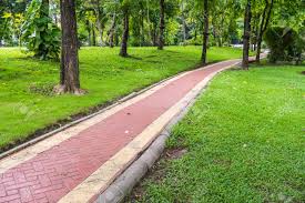 Brick as a walkway border. Red Brick Walkway In Green Public Park Stock Photo Picture And Royalty Free Image Image 101977919