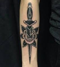 Te blue flower looks pretty amazing and adds color to the whole dagger design. Daggaer In Rose Tattoo Women Google Search Dagger Tattoo Traditional Dagger Tattoo Tattoos