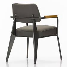 The Letter F In Our Festive Overview Of Iconic Chairs Is Represented By French Designer Jean Prouve S Fauteui Chair Fully Upholstered Dining Chair Prouve Chair